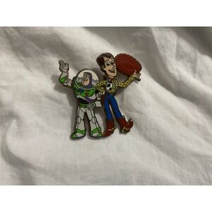 Walt Disney spring arm Woody and Buzz Lightyear Toy Story pin.
